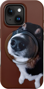 Phone case with a dog's face design on a brown background